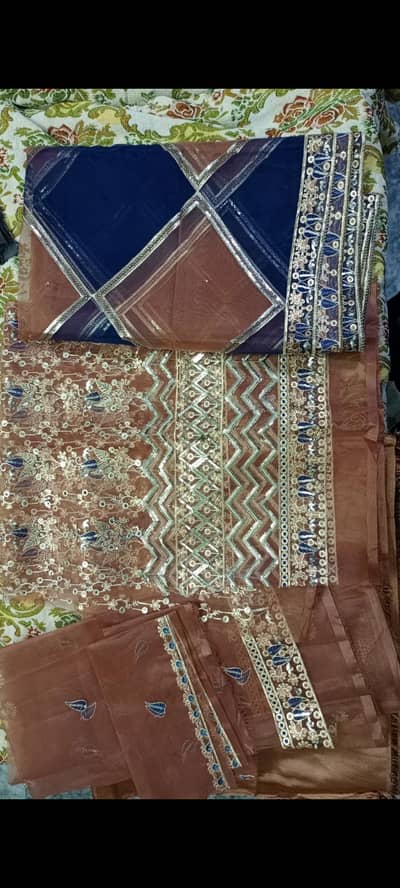 Brand new Fancy unstitched suit with inner suit. .