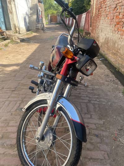 Honda 70 Red Color – 9/10 Condition – Smooth Ride