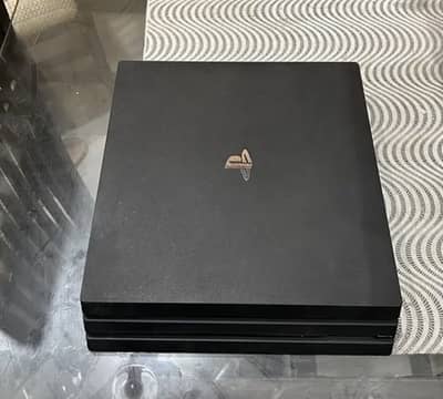 Ps4 pro with 2 original controllers and 12 digital games