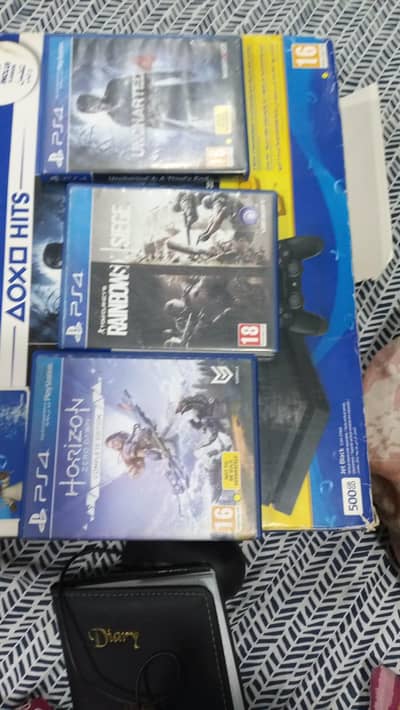 playstation 4 slim 500 GB clean. (full set with 3 free games)