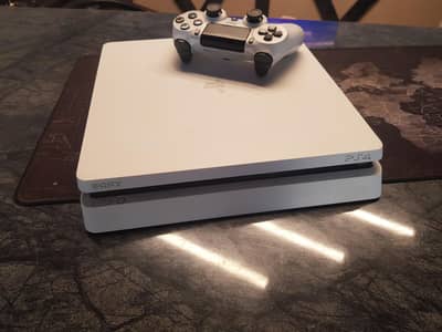 PS4 with White Controller -Games Installed (FC 25, GTA V, Cricket 24)