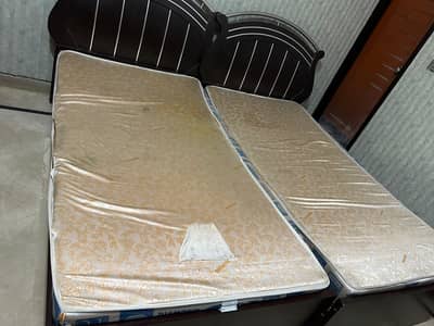 2 single wooden beds for sale with mattress