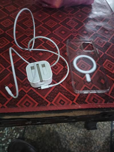 I phone original charger plus cable and I phone 11 pro max back covers