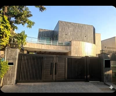 One Kanal Corner Slightly Used Ultra Modern Designer Owner Build Fully Furnished Bungalow 25KV Solar Attached For Sale At Prime Location Of DHA Lahore Near To Park Masjid & Commercial Market.