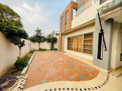 One Kanal Slightly Used Like Brand New Ultra Modern Designer Owner Build Bungalow For Sale At Prime Location Of DHA Lahore Near To Park Masjid & Commercial Market.