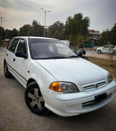SUZUKI CULTUS VXR 2006 MODAL ISLAMABAD REG NEW RIM TYRES AC CNG Auto L