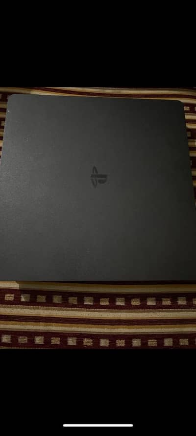 PS4 slim with free games and 2 controllers
