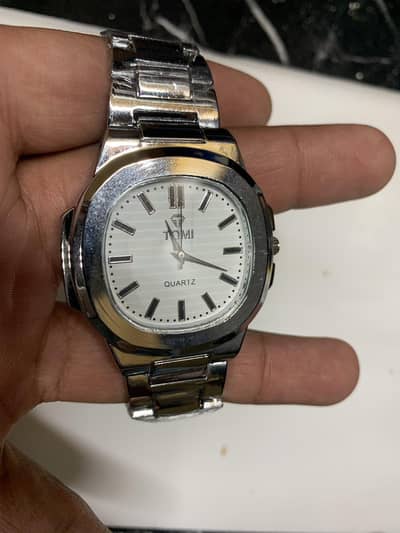 tomi watch ⌚