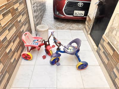 Two small Three tyres cycles