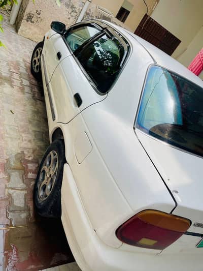 Suzuki baleno white color Exchange possible with car03433012651