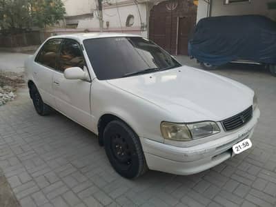 TOYOTA COROLLA E-111  SE SALOON LIMITED 1997/2004 . PEARL WHITE . .