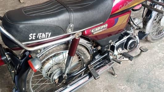 Honda CD 70 bike 2004 model Lahore ka number 03.26. 54.48. 90.1.