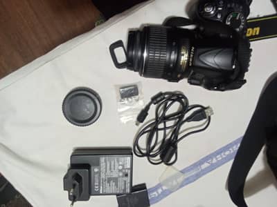 Nikon D3100 for urgent sale