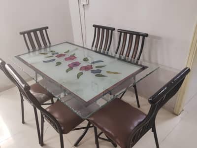 Iron frame dining table with 6 chairs  new condition