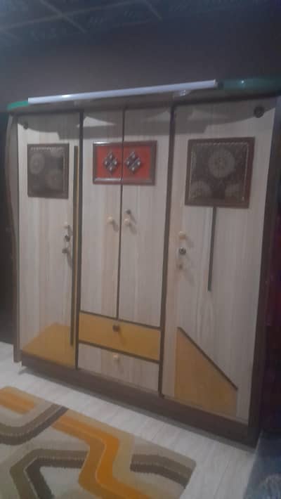 Acha bed set h with cupboard dressing table side table. 56000.