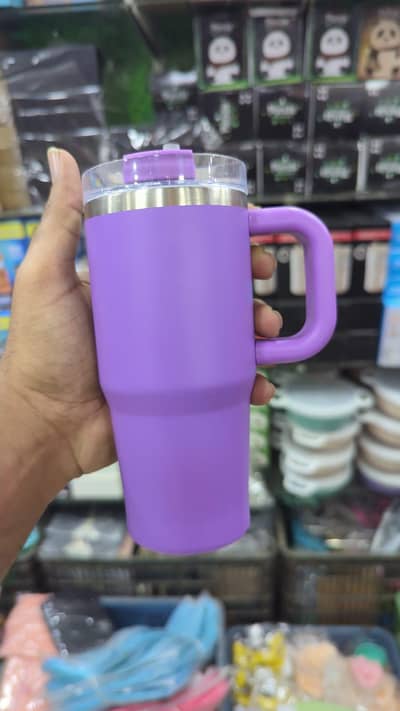 Stylish purple tumbler mug with lid and sipper