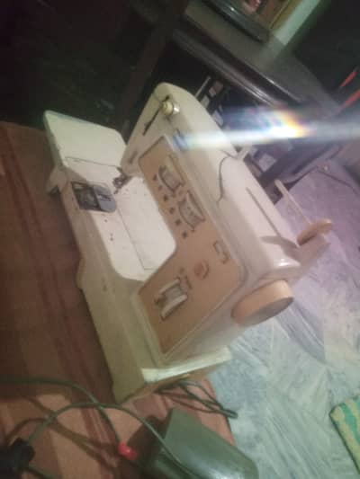 singer Sewing and peeko machine