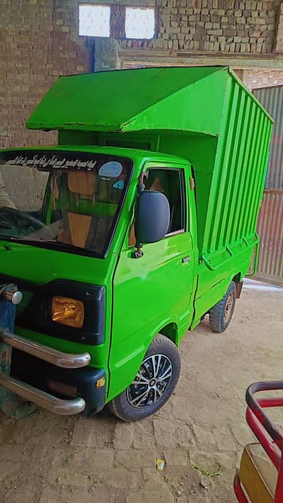 Suzuki Ravi 2015 green