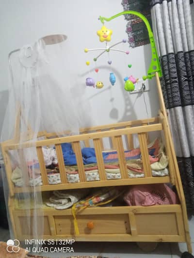 baby crib and swing