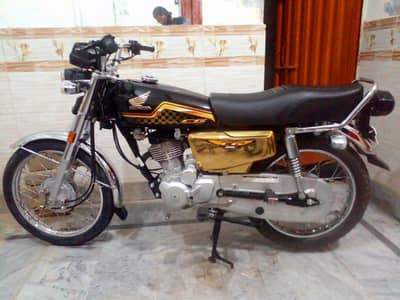 honda 125  24 model special gold edition 5 gear