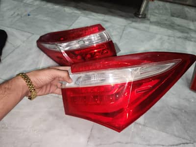 corolla grande back light 2014 model only one damage
