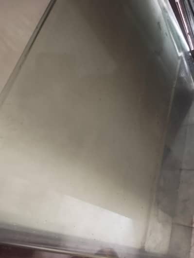 glass top of coffee table