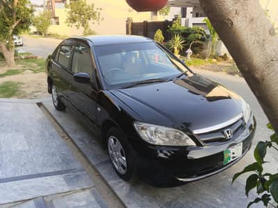 Homda civic for sale my family use car almost genuine.