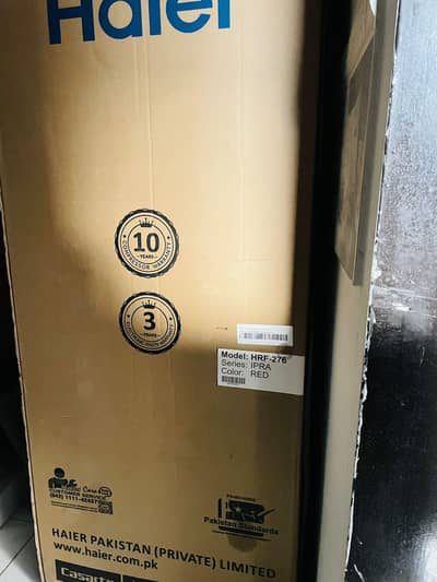 Haier refrigerator, model HRF-276, Red glass door