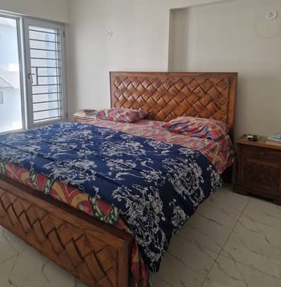 Pure wood. King size bed and side tables