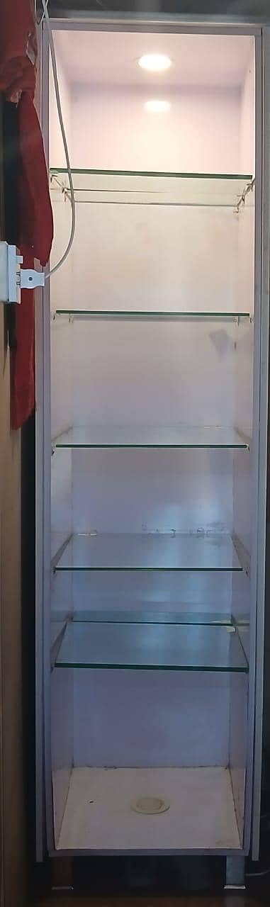 white solid multipurpose rack with glass slabs 1
