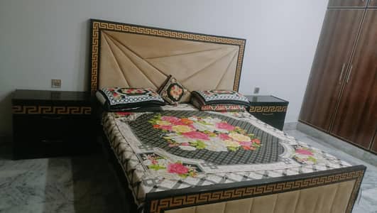 Bed with side tables