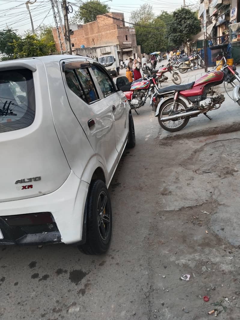 ٹوٹل جینین،پاور سٹیرنگ، پاور لاک،الائرم انسٹال ،سپینسن فٹ،اےسی چالو 2