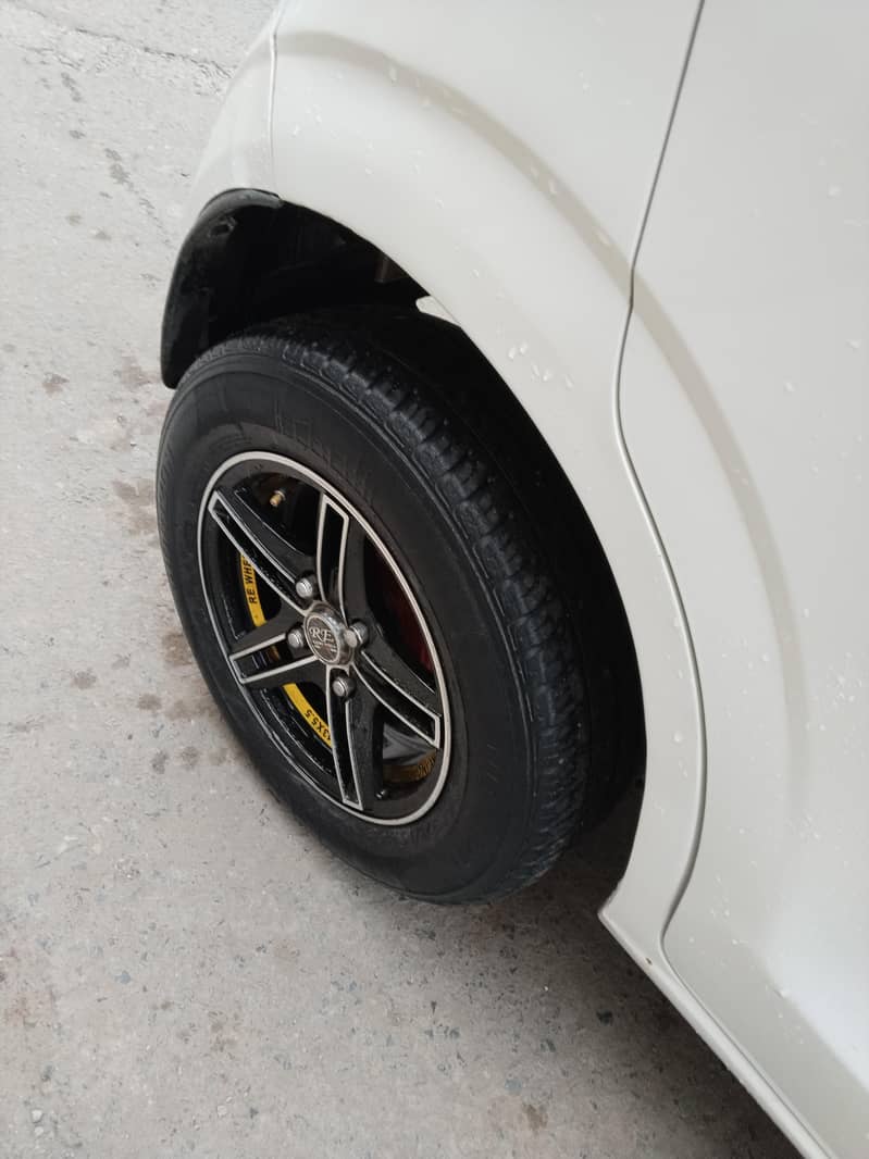 ٹوٹل جینین،پاور سٹیرنگ، پاور لاک،الائرم انسٹال ،سپینسن فٹ،اےسی چالو 4