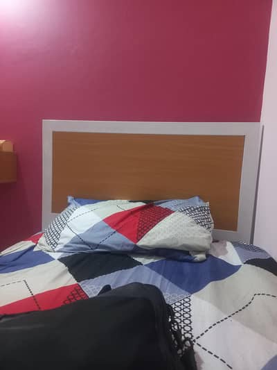 Single bed with side table