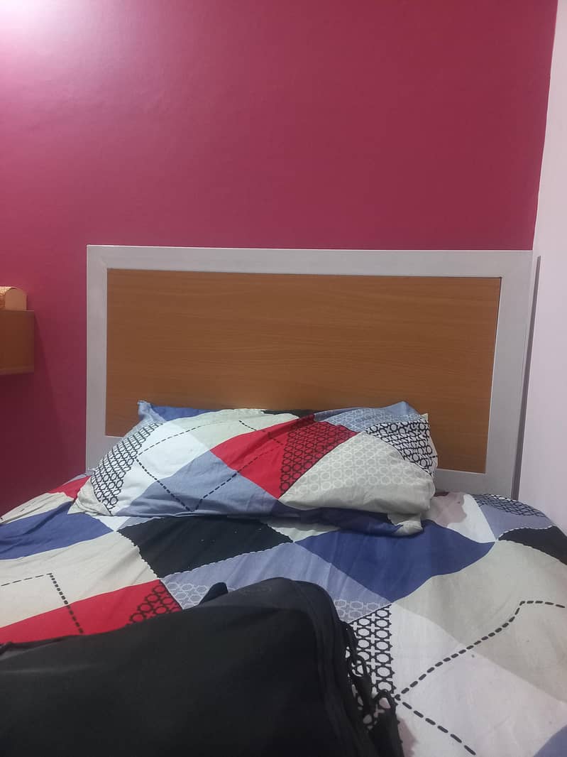 Single bed with side table 0