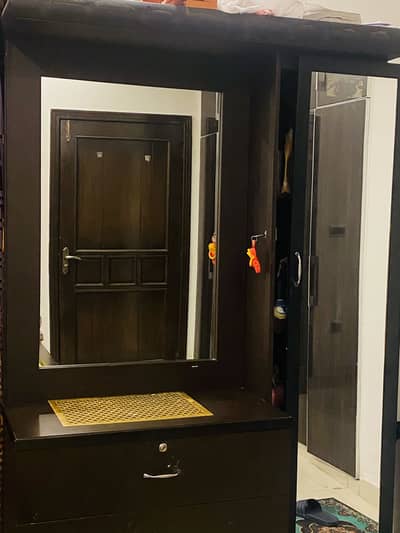 Full length dressing table with sliding door and 3 drawers.