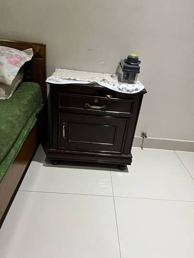 2 Single Beds without matress and 1 Side Table