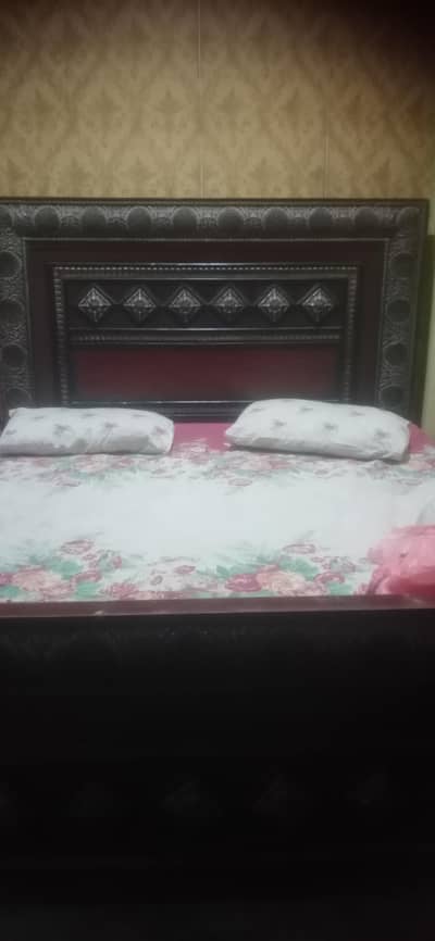 double bed with side tables