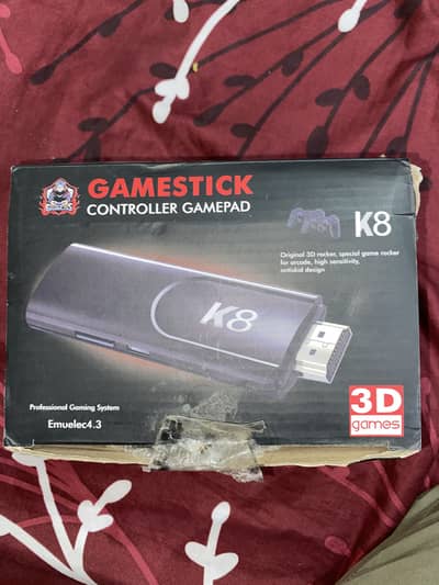 K8 Game Stick 40,000 games with 2 controllers