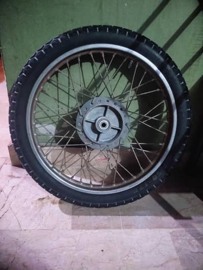 I AM SELLING MY BIKES SPARE TYRE+ TUBE+RIM+DRUM WITH NEW BEARING