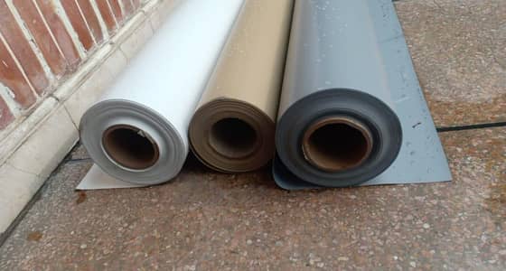 Pvc tensile fabric.  tensile fabric in lahore.  car parking shades