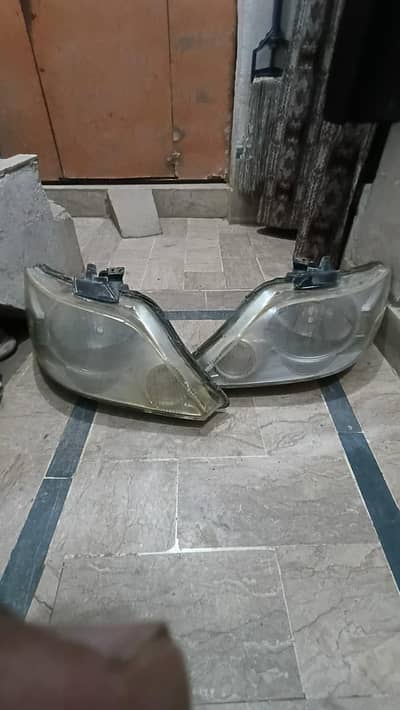 Honda City idsi variyo 2009 model hai front headlights original