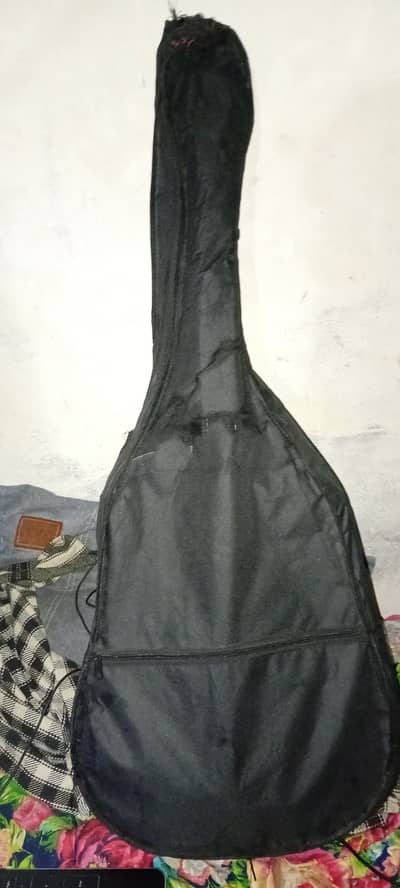 Q F Full size guitar with bag, neck band and pike