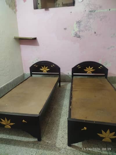 single Beds and cupboard