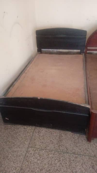 single Beds and cupboard