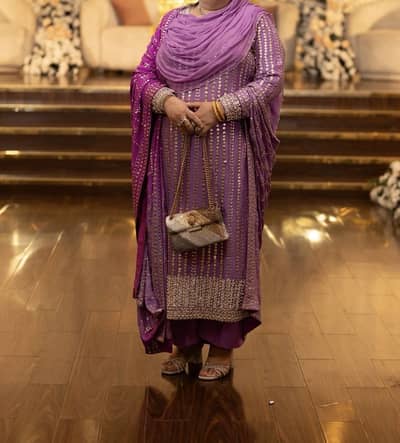 Heavy Mukesh embroidered three piece party wear