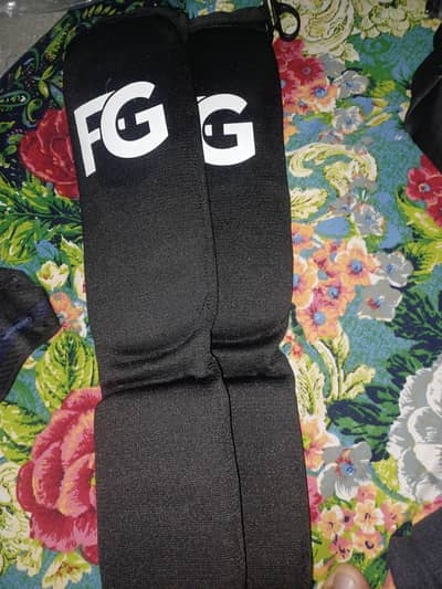 Martial arts shin guards for protection during activities