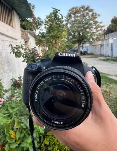 Canon 1200 D with 18 - 55 lenz