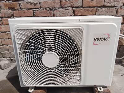 homage inverter air conditioner 1 ton use like new. . . 03006611983