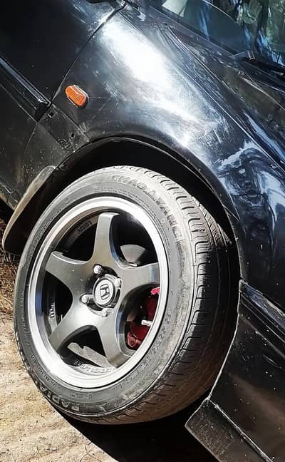 sports leader 15 inch rim, with tire rim condition  100 OK tire 80%